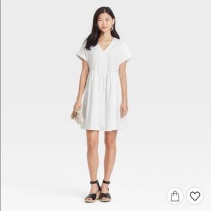 White linen blend babydoll dress. Never worn!